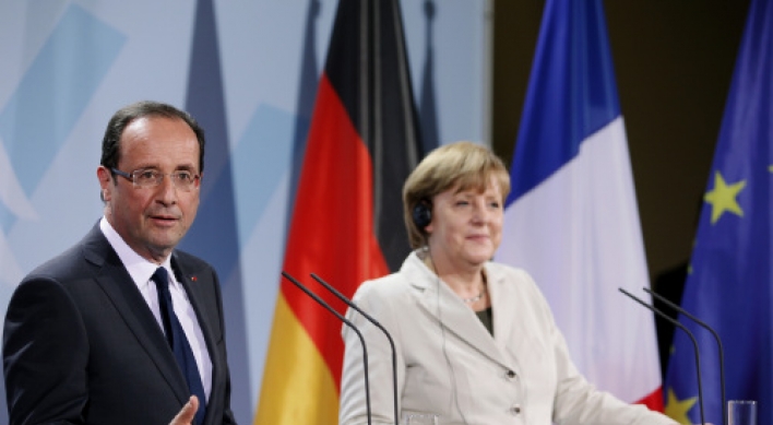 Merkel, Hollande say will keep eurozone together