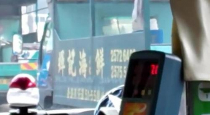 A YouTube video reveals amazing multi-tasking by bus driver
