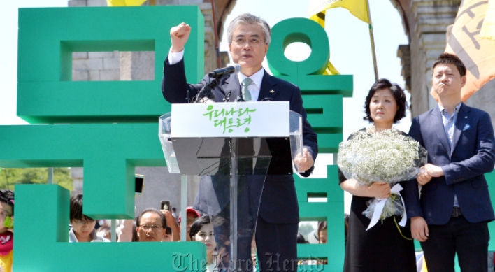 Moon Jae-in throws hat into presidential race