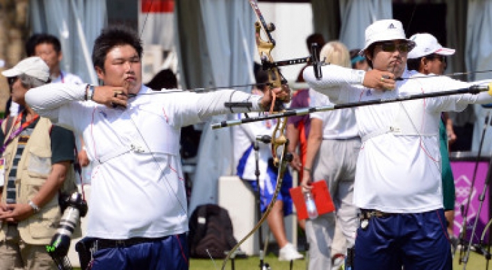 Archers begin chase for gold on opening day of London Olympics