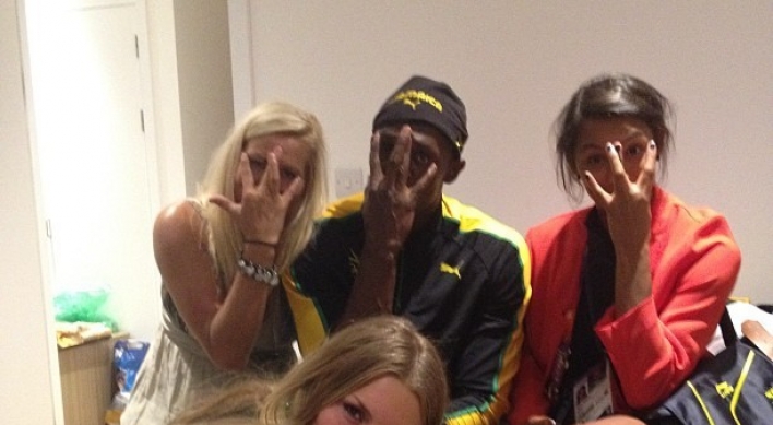 Usain Bolt enjoys midnight party with Swedish female athletes after 100m win