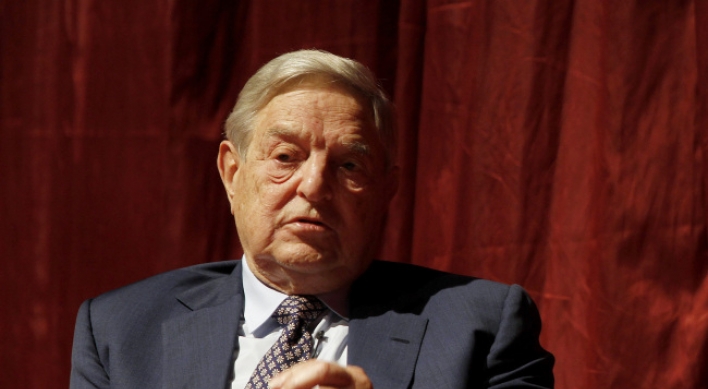 Germany risks recession by enforcing euro austerity: Soros