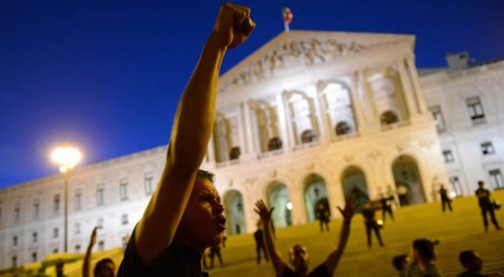 Portugal hikes more taxes to cut debt