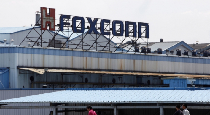 Foxconn workers return to iPhone production after stoppage