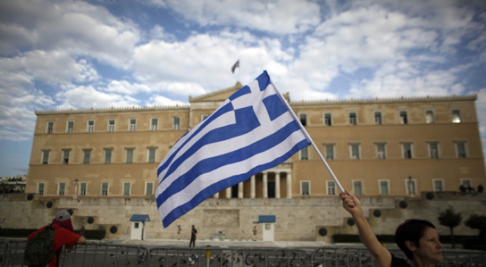 Troika hopes for Greek debt deal within days