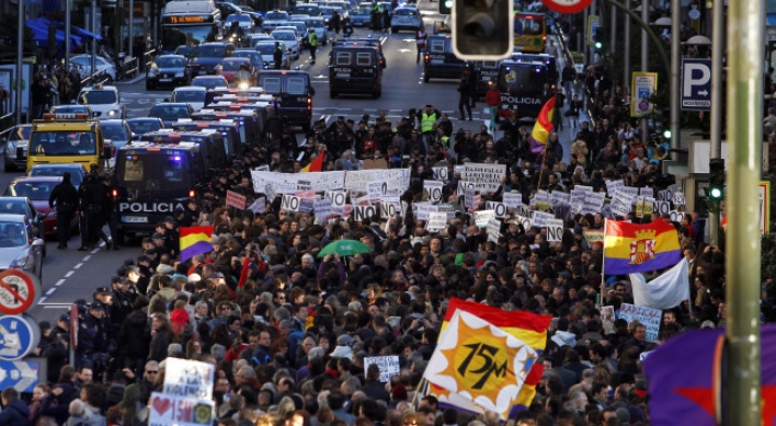 Thousands join new Spain protest