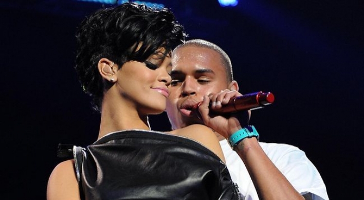 Chris Brown denies he is dating Rihanna