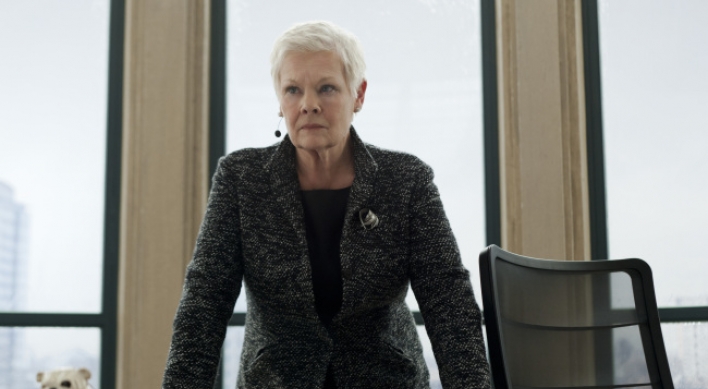 As mom to Bond, Dench reflects on her 007 reign