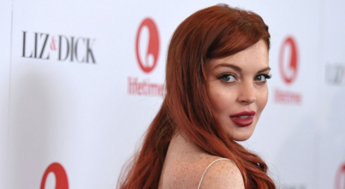 Lohan says red carpet ‘feels great’