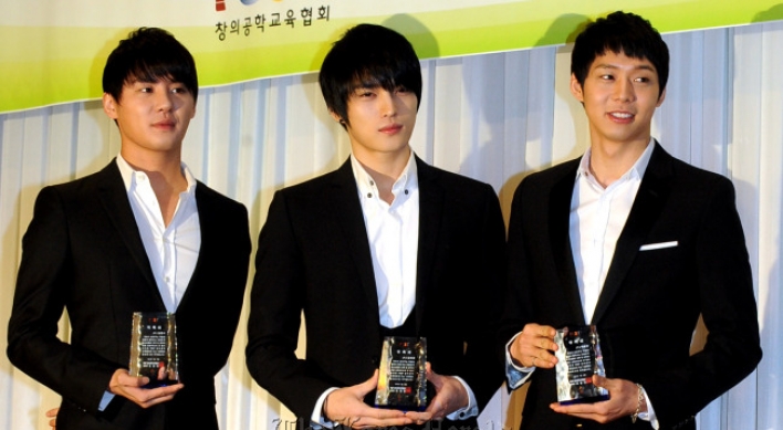 JYJ and S.M. Entertainment end three-year legal spat