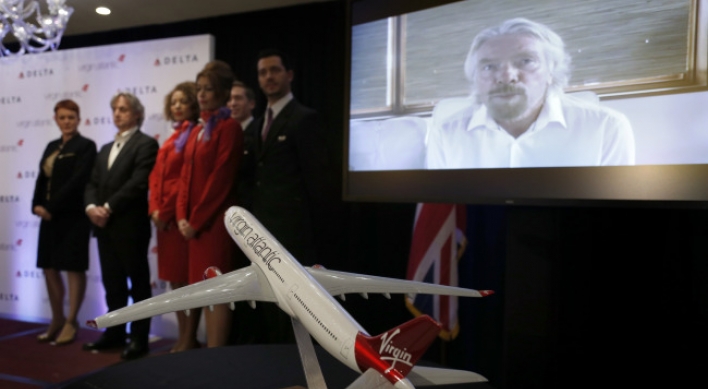 Delta buys 49% stake in Virgin tlantic