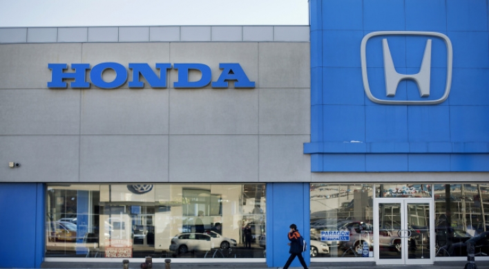 Honda recalls 871,000 cars on roll away defect