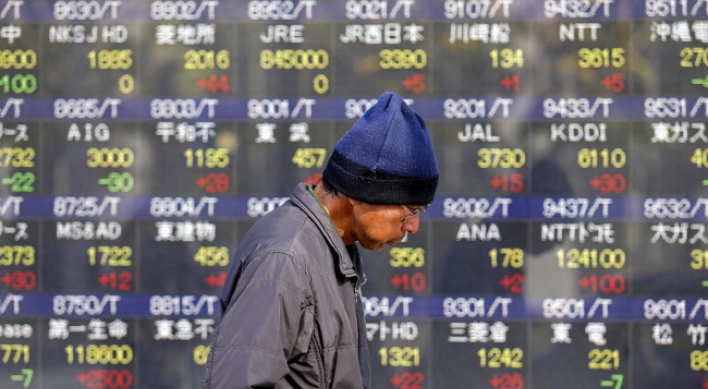 Japan’s Aso hits out at BOJ: reports