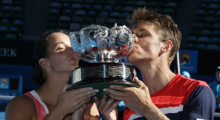 Gajdosova-Ebden win mixed doubles