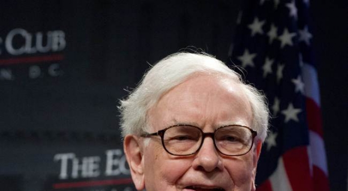 Buffett firm’s profits rise on paper gains