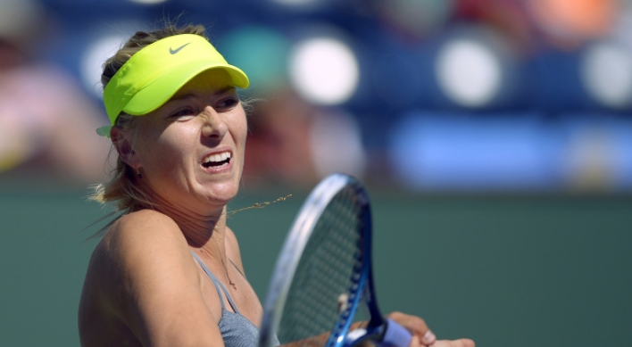 Djokovic, Sharapova win at Indian Wells