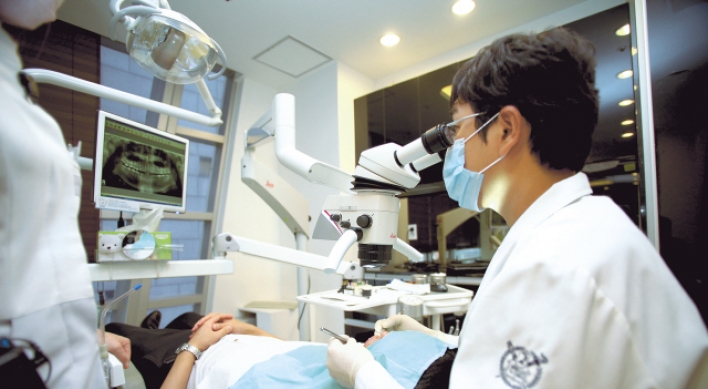 Dental microscopes boost quality of treatment