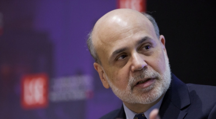 Fed’s low-interest-rate policies help world economy, Bernanke says