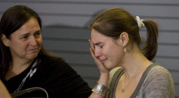 Italian court orders new trial for Amanda Knox