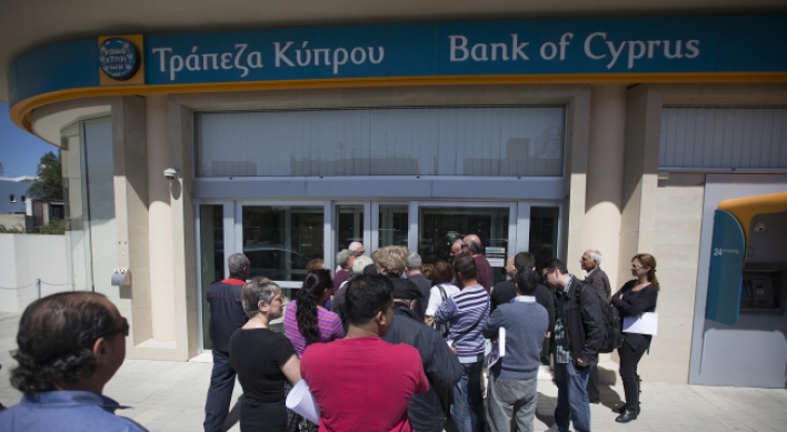 Cyprus capital controls could be lifted in a month