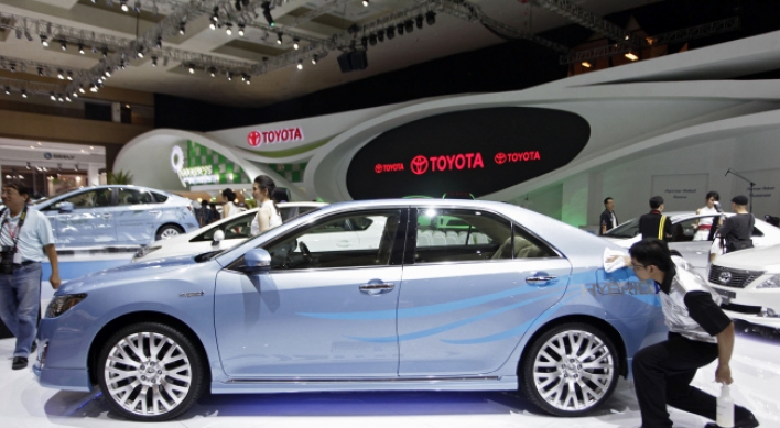 Camry battles spruced-up rivals in midsize market