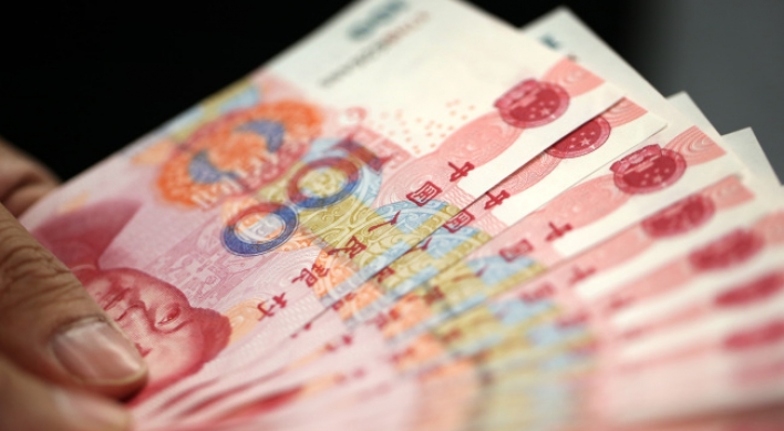 Fitch cuts China yuan debt rating on local government