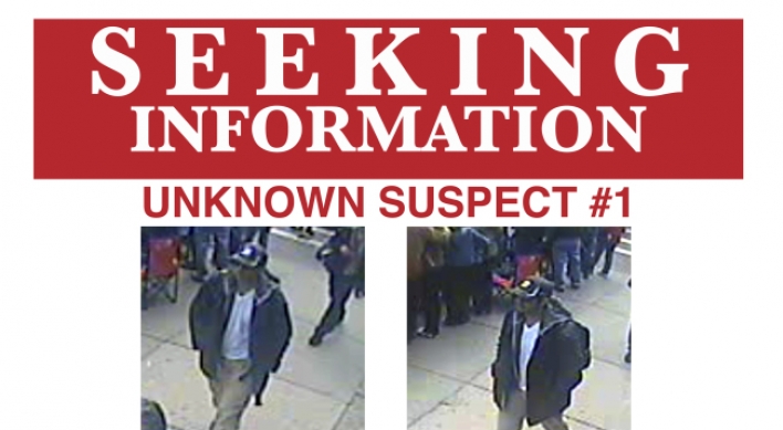 FBI releases images of 2 men at Boston Marathon