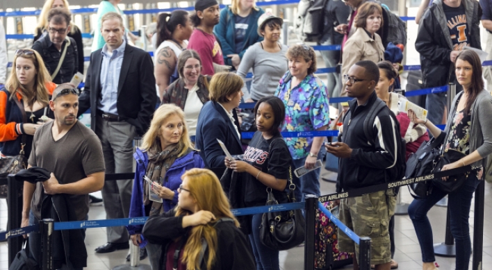 Flight delays pile up amid budget cuts