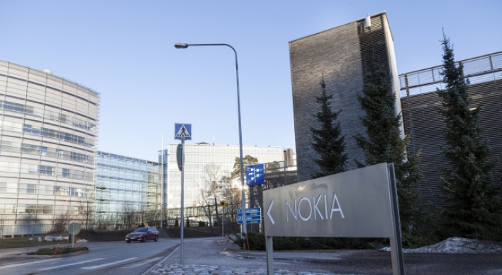 Nokia betting on $20 handset as it loses ground to iPhone