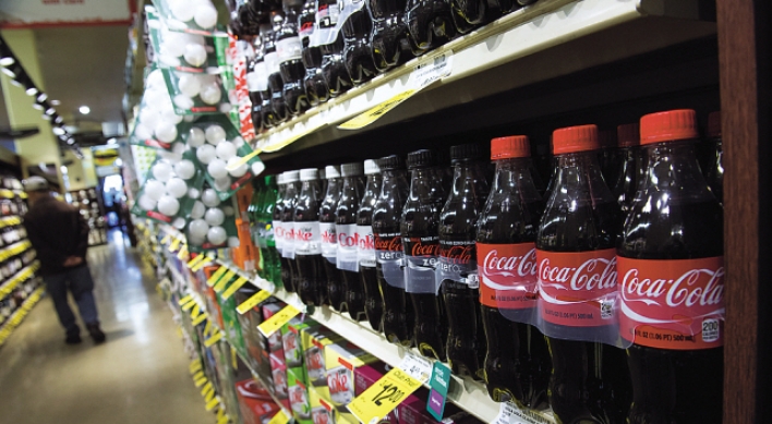 Coke goes global with anti-obesity push