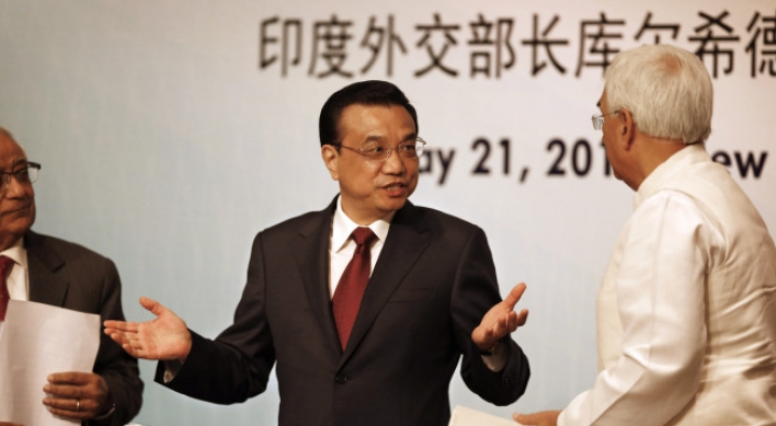 Chinese premier vows to open up markets to India