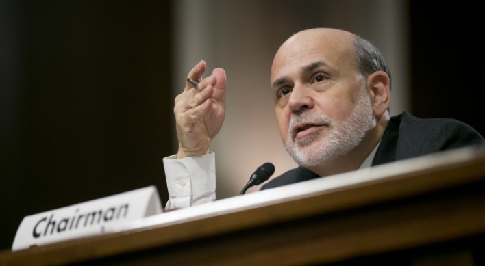 Bernanke signals Fed to stay course