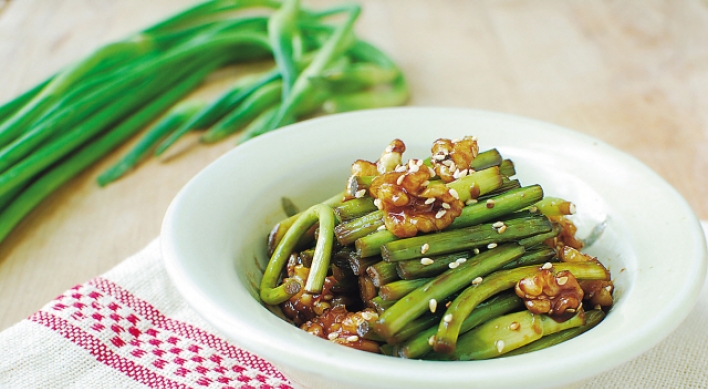 Maneuljjong hodu bokkeum (Stir-fried garlic scapes with walnuts)