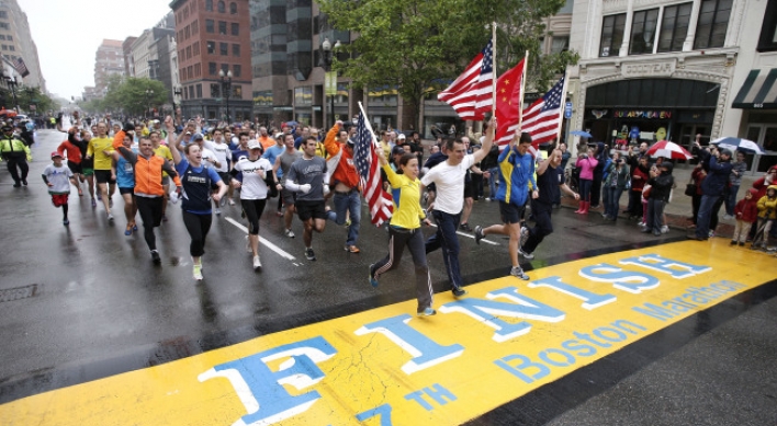 Thousands walk, run final mile of Boston Marathon