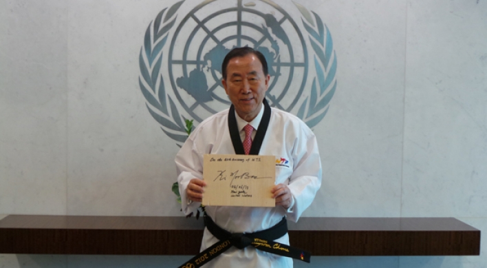 Ban receives honorary black belt in taekwondo from WTF