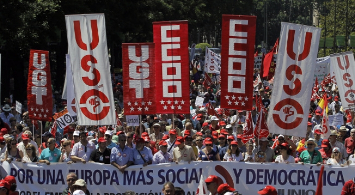 Spaniards march against government austerity