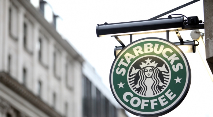 Starbucks says pays British corporation tax after row