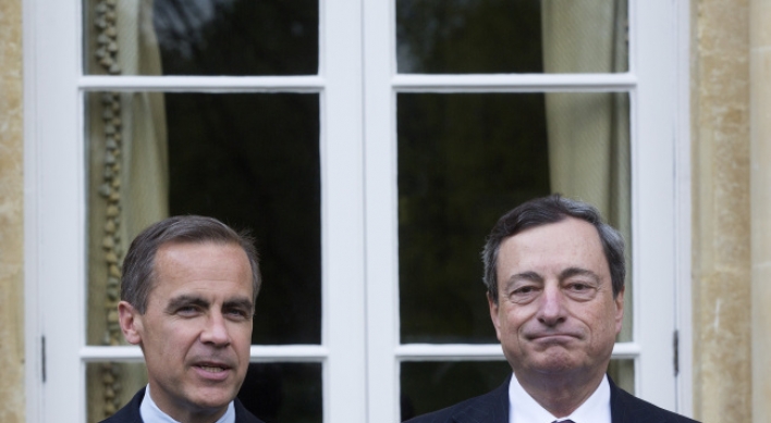 ECB, BOE soothe markets in rate pledge