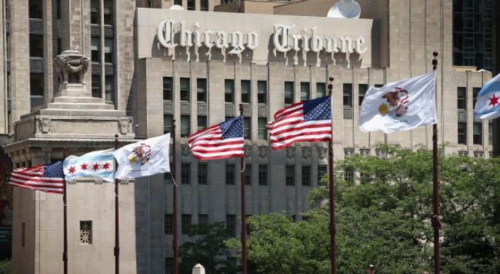 Tribune to split into two firms