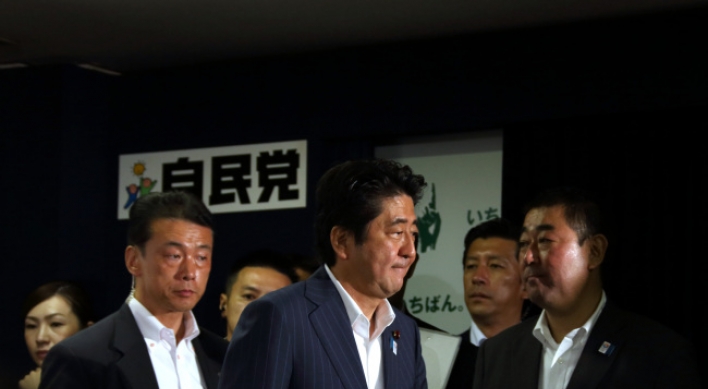 Japan's ruling bloc wins upper house elections