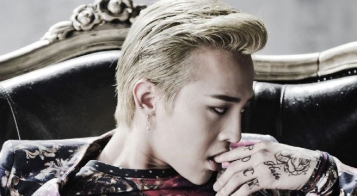 G-Dragon donates 80m won to charity