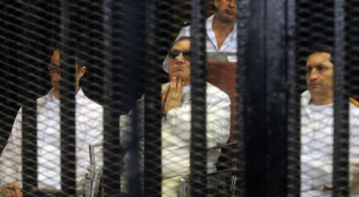 Mubarak back in Egypt court, Brotherhood trial adjourned