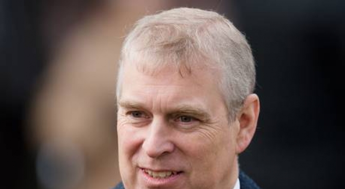 Prince Andrew challenged by police in palace gardens