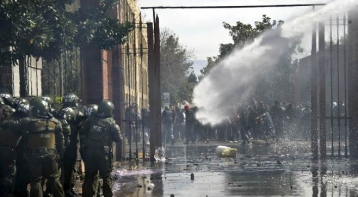 Forty years after Pinochet coup, thousands march for rights in Chile