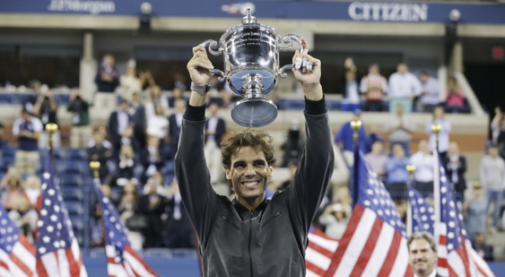 Nadal tops Djokovic for 13th major title