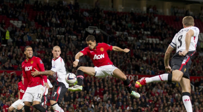 United spoils Suarez’s Liverpool return