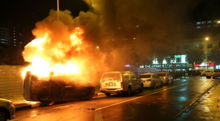 18 hurt after Singapore's worst rioting in decades