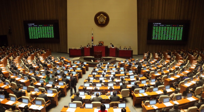 Parliament belatedly approves budget, foreign investment bills