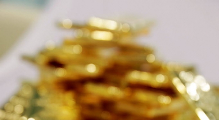 Gold sees biggest yearly rout since ’81