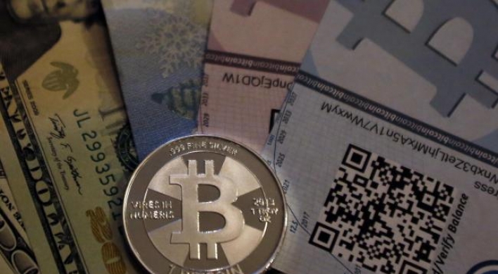 Bitcoin dealers charged with money laundering